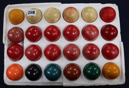 A set of snooker balls, some ivory